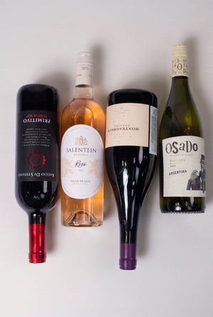 Primitivo, Reserva Rosé, Monteagrelo e Osado Malbec Blanco deitados